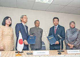 The signing of an MOU between IOP and CCDUM